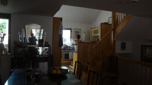 Alex in the kitchen. Me in the mirror.